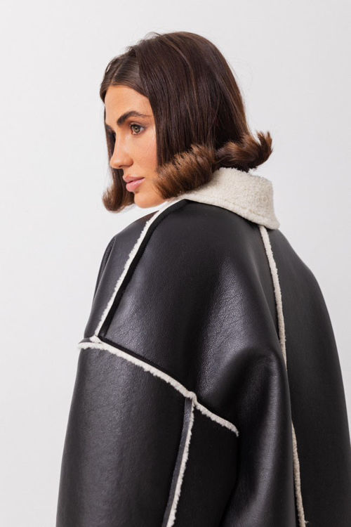  Зображення Жіноча дублянка подовжена -чорна з молочним хутром 